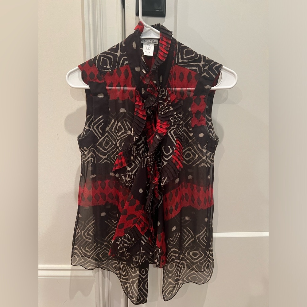 | Oscar de la Renta | Aztec blouse.